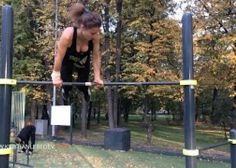 Workout girl team Kristian Lebedev physical exercise .